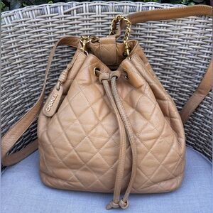 Authentic CHANEL quilted beige caviar leather bucket top handle backpack